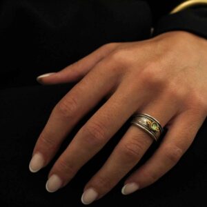 Silver Ring with Goldplated Parts and Peridot